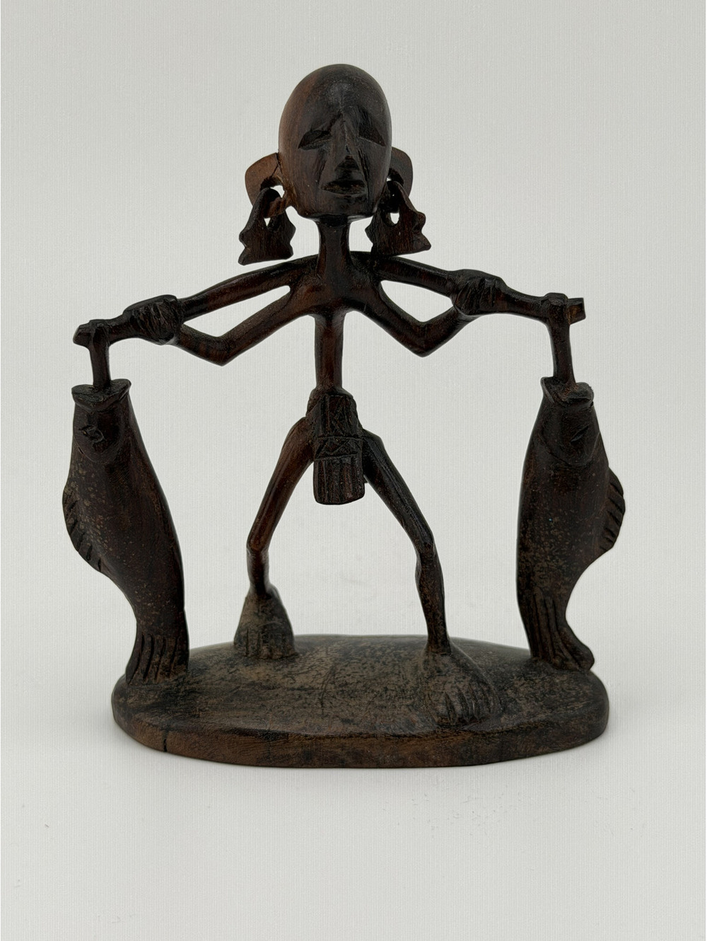 Vintage African wooden Art Fishing man Holding 2 fishes